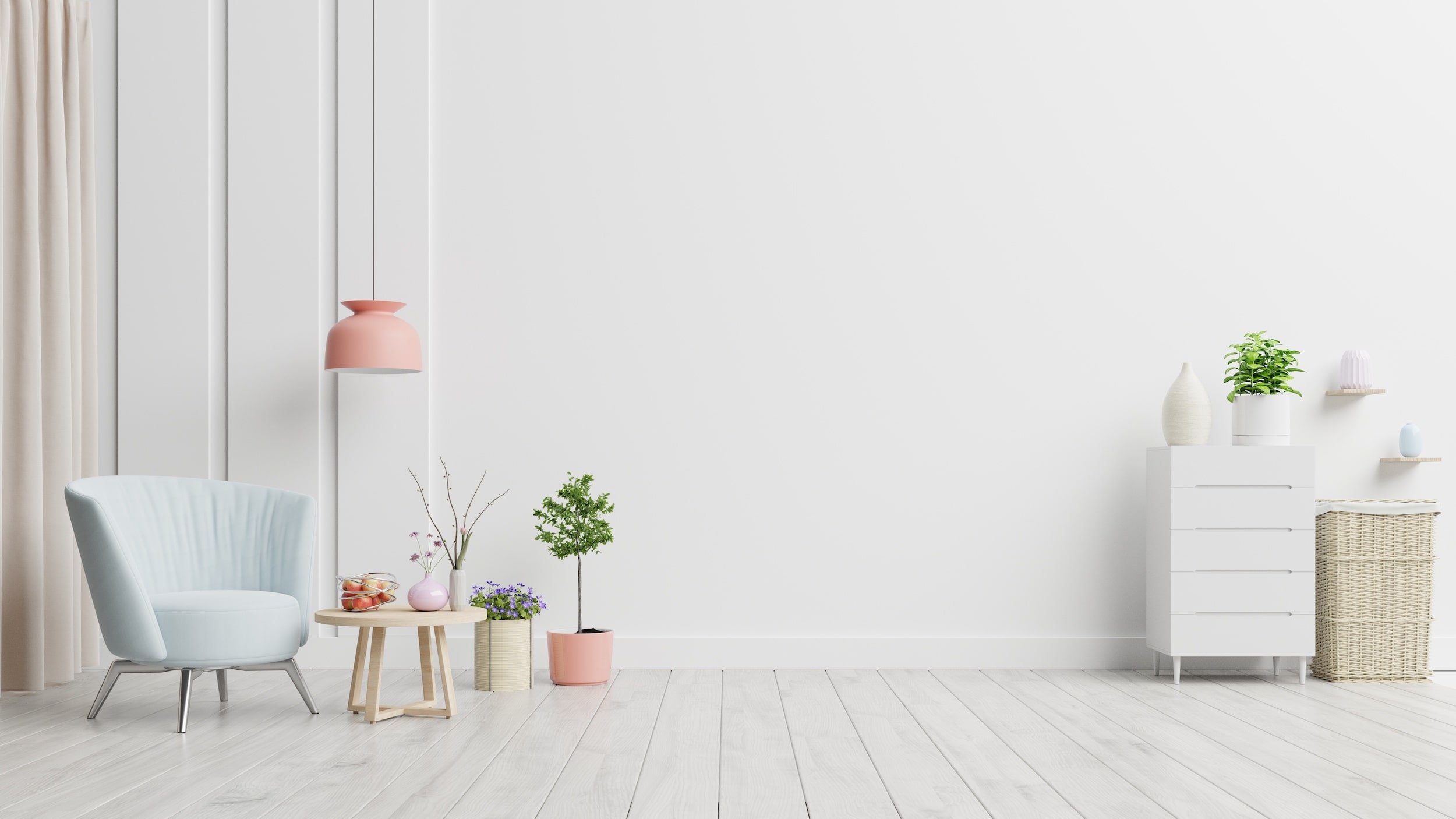 Bright, freshly painted white interior wall with a modern blue armchair, small table, and decorative